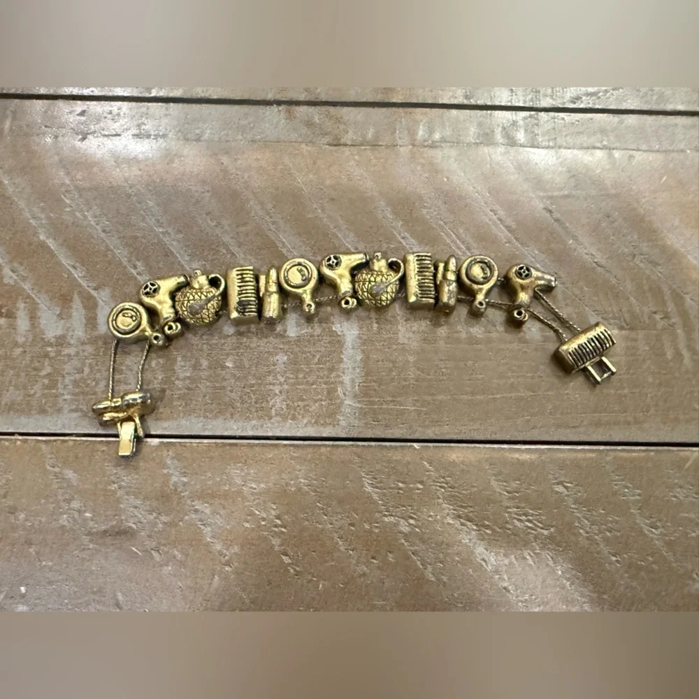 Vintage Hair and Makeup Gold Tone Charm Bracelet